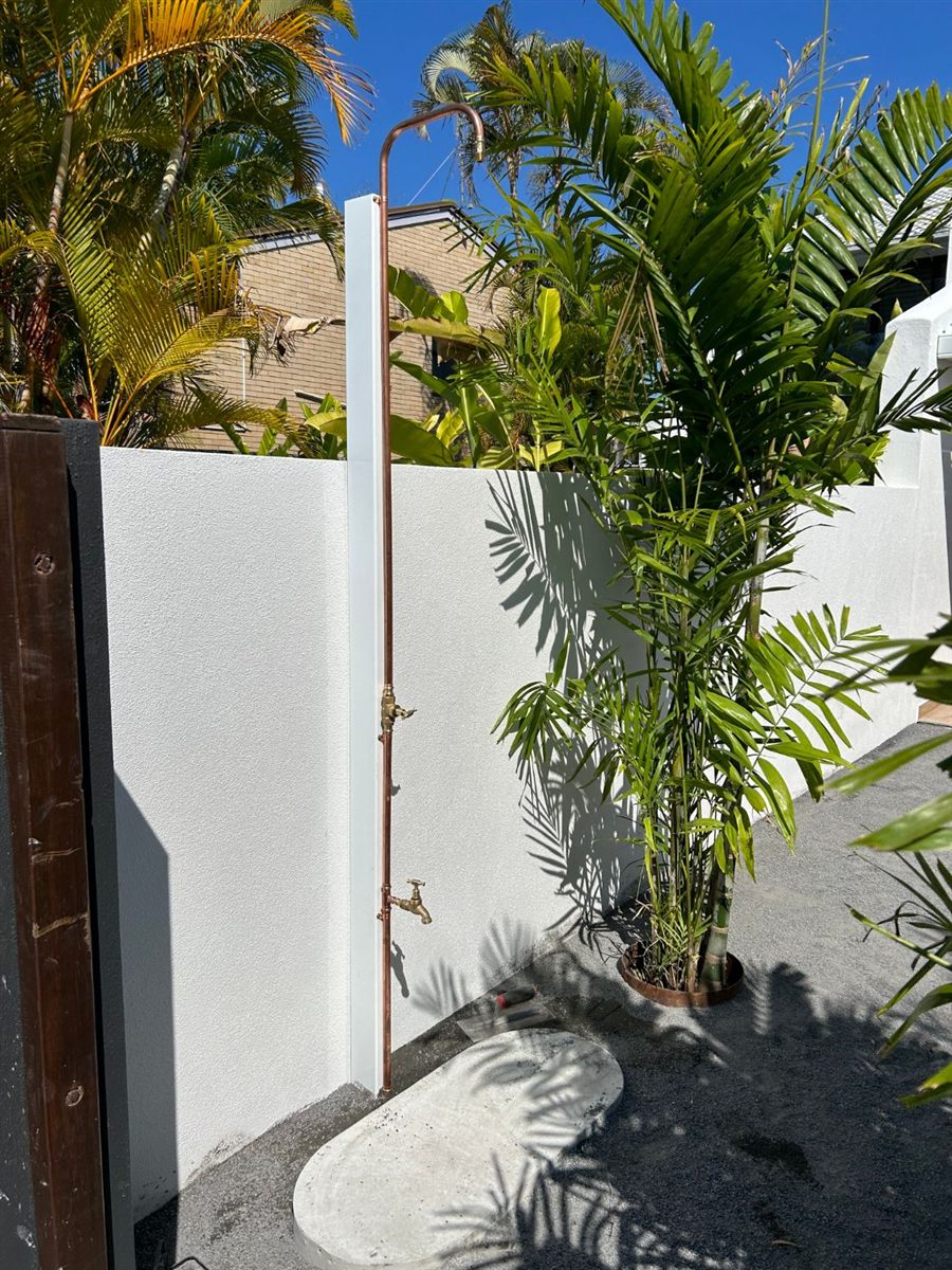Copper outdoor shower with brass taps